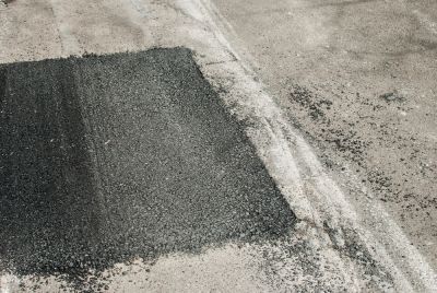 Patch Areas of Asphalt Needing Repair